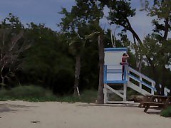 Cocksucking lifeguard analized on the beach