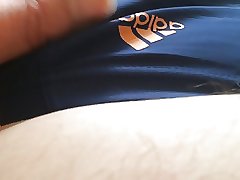 I In Adidas Speedo dark blue orange stripes