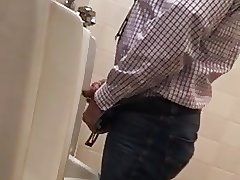Spying daddy in urinal