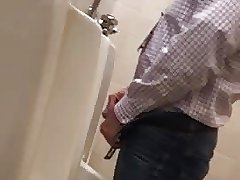 Spying daddy in urinal