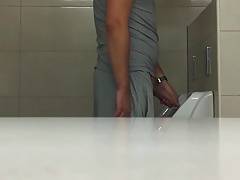 Huge Uncut Cock in Public Washroom