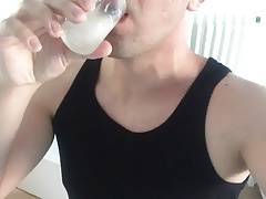 Drinking a cup of cum